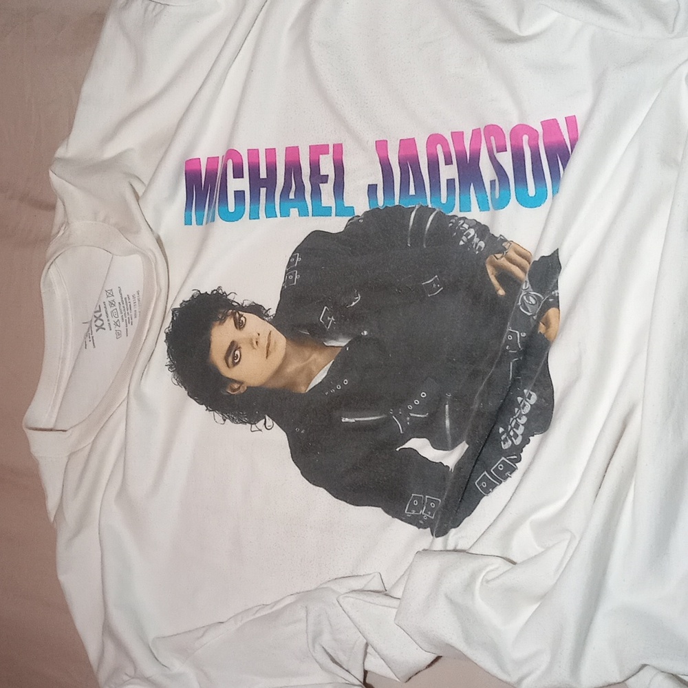 This is a white Michael Jackson themed t shirt.